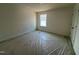 Light-filled bedroom with a large window and closet space at 88 Willow Cameron Way, Angier, NC 27501