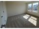 Carpeted bedroom with two windows that let in natural light at 88 Willow Cameron Way, Angier, NC 27501