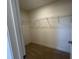 Small walk-in closet with wire shelving at 88 Willow Cameron Way, Angier, NC 27501