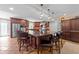 Expansive kitchen with stainless steel appliances, a central island, and ample cabinet space at 8808 Colesbury Dr, Raleigh, NC 27615