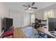 Office space with wood flooring, a ceiling fan, and abundant natural light at 8808 Colesbury Dr, Raleigh, NC 27615