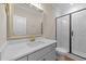 Modern bathroom featuring a marble countertop vanity and glass-enclosed shower at 90 Lane Farms Way Way, Holly Springs, NC 27540