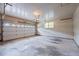 Spacious garage featuring an automatic door opener with a clean, neutral aesthetic at 913 Milton Rd, Durham, NC 27712