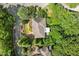 Aerial view of the home showcasing the landscape, well-kept roof and surrounding streets at 101 Cardiff Pl, Chapel Hill, NC 27516