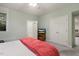 Light and airy bedroom features large closet, ceiling fan, and attached bathroom at 101 Cardiff Pl, Chapel Hill, NC 27516