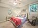 Charming bedroom with chair and lots of natural light at 101 Cardiff Pl, Chapel Hill, NC 27516