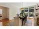 Bright dining room boasting hardwood floors, neutral walls, and large windows with natural light at 101 Cardiff Pl, Chapel Hill, NC 27516