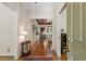 Open foyer with gleaming hardwood floors leads into a bright and spacious living area at 101 Cardiff Pl, Chapel Hill, NC 27516