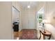 Welcoming foyer featuring hardwood floors, elegant lighting, and access to multiple rooms at 101 Cardiff Pl, Chapel Hill, NC 27516