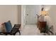 Hallway features a cushioned bench seat, wooden accent table and staircase at 101 Cardiff Pl, Chapel Hill, NC 27516