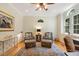 Cozy living room featuring hardwood floors, classic furniture, and natural lighting at 101 Cardiff Pl, Chapel Hill, NC 27516