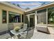 Outdoor patio with table and chairs, perfect for entertaining or relaxing in the fresh air at 101 Cardiff Pl, Chapel Hill, NC 27516