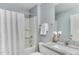 The bathroom features a shower with white tile and a vanity with granite countertop at 1019 Tranquil Crk Way, Wake Forest, NC 27587
