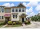 Charming two-story townhome with well-manicured landscaping and inviting entrance at 1019 Tranquil Crk Way, Wake Forest, NC 27587