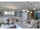 Eat in kitchen with granite countertops and stainless sink at 1019 Tranquil Crk Way, Wake Forest, NC 27587