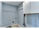This laundry room has tile flooring, wire shelving and a hanging rack at 1019 Tranquil Crk Way, Wake Forest, NC 27587