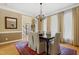 Elegant dining room features hardwood floors, chandelier and ample natural light at 104 San Sophia Dr, Chapel Hill, NC 27514