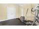 Home gym with exercise equipment and mirrored wall to make your workouts convenient at 104 San Sophia Dr, Chapel Hill, NC 27514