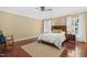 Comfortable main bedroom with a ceiling fan and hardwood floors at 104 San Sophia Dr, Chapel Hill, NC 27514