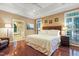 Spacious main bedroom with hardwood floors and ensuite bathroom at 104 San Sophia Dr, Chapel Hill, NC 27514