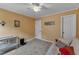 Versatile bedroom featuring neutral carpet and a large window for plenty of natural light, creating a welcoming atmosphere at 1123 Poplar Forest Ln, Pittsboro, NC 27312