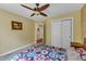 Spacious bedroom featuring soft carpet and large window. The perfect room for relaxing and enjoying a peaceful night's sleep at 1123 Poplar Forest Ln, Pittsboro, NC 27312