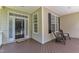 Inviting front porch with seating area, offering a relaxing outdoor space at 1123 Poplar Forest Ln, Pittsboro, NC 27312