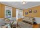 Inviting living room with natural light, hardwood floors, and comfortable seating at 1123 Poplar Forest Ln, Pittsboro, NC 27312