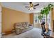 Inviting living room featuring neutral walls, couch and lots of natural light at 1123 Poplar Forest Ln, Pittsboro, NC 27312