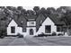 Stunning new construction featuring a stylish mix of painted brick and vertical board and batten at 115 Evington Dr # 29, Pittsboro, NC 27312
