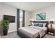 Stylish staged bedroom featuring comfortable bed and decor at 1204 Bridgewater Dr, Durham, NC 27704
