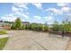 Community space with benches, trees, and walking path at 1204 Bridgewater Dr, Durham, NC 27704