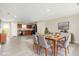 Dining room features a large table set for a meal and a kitchen view at 1204 Bridgewater Dr, Durham, NC 27704