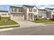 Exterior view of a two-story home with a two-car garage and a well-maintained front lawn at 1204 Bridgewater Dr, Durham, NC 27704