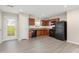 Spacious kitchen featuring ample cabinets, modern appliances, and wood look flooring at 1204 Bridgewater Dr, Durham, NC 27704