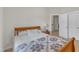 Cozy bedroom featuring a comfortable bed with a decorative quilt and a wooden headboard at 12227 Orchardgrass Ln, Raleigh, NC 27614