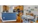Stylish eat-in kitchen features wood cabinetry, modern appliances, and a charming breakfast nook at 12227 Orchardgrass Ln, Raleigh, NC 27614