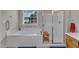 Bright main bathroom featuring a garden tub and a separate shower at 12227 Orchardgrass Ln, Raleigh, NC 27614