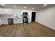 Modern kitchen featuring white cabinets, stainless steel appliances, and a stylish backsplash at 1225 Gay St, Rocky Mount, NC 27804