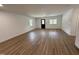 Bright living room with hardwood floors and plenty of natural light from the many windows at 1225 Gay St, Rocky Mount, NC 27804