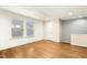 Spacious bedroom with hardwood floors and large windows at 12309 Aberdeen Chase Way, Durham, NC 27703