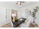 Stylish home office featuring modern decor, ample lighting, and French doors at 1625 Plover Cir, Fuquay Varina, NC 27526