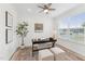 Bright home office with a ceiling fan, natural light, and contemporary decor at 1625 Plover Cir, Fuquay Varina, NC 27526