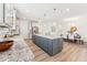 Open kitchen with granite counters, an island with bar seating, and stainless appliances at 1625 Plover Cir, Fuquay Varina, NC 27526