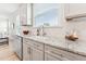 Bright kitchen with stainless steel appliances, granite countertops, and white cabinetry at 1625 Plover Cir, Fuquay Varina, NC 27526
