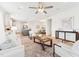 Bright, airy living space with wood floors, modern furniture, and an open floor plan at 1625 Plover Cir, Fuquay Varina, NC 27526