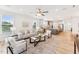 Open-concept living area with a modern kitchen and plenty of natural light at 1625 Plover Cir, Fuquay Varina, NC 27526