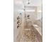 Luxury shower with pebble floor, rainfall showerhead, built-in bench, and convenient grab bars at 1625 Plover Cir, Fuquay Varina, NC 27526