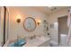 Bathroom featuring a vanity, toilet, and a glass-door enclosed shower at 1815 Hawthorne Ln, Burlington, NC 27215