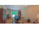 Well-lit dining room features hardwood floors and is decorated with stylish furniture at 1815 Hawthorne Ln, Burlington, NC 27215